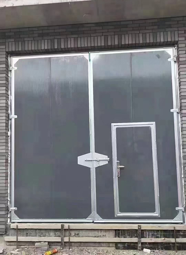 庆阳工业平开门在大型设备制造车间的应用实例